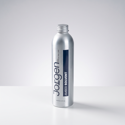 Jorgen Amber Super Solvent adhesive remover in a silver aluminum bottle