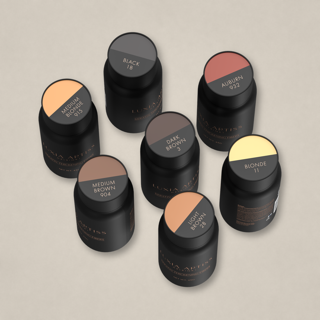 Luxia Artiss Keratin Thickening Fibers in seven shades on light stone