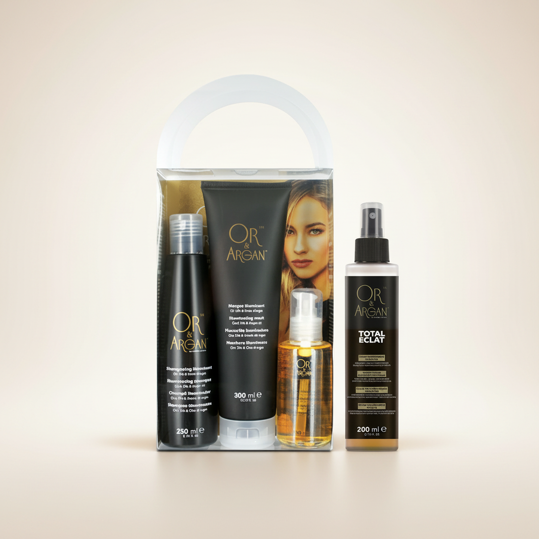 OR &amp; Argan Kit Illuminant with Shampoo, Masque, Fluide and Total Eclat on a warm studio backdrop